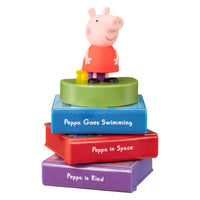 Load image into Gallery viewer, Peppa Pig figurine on books with titles 'Peppa Goes Swimming', 'Peppa in Space', and 'Peppa is Kind' on a white background.