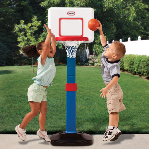 boy and girl playing basketball