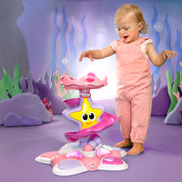Load image into Gallery viewer, Child stood playing with a toy starfish in an underwater-themed setting