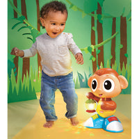 Load image into Gallery viewer, Child playing with a light up toy monkey