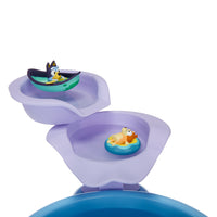 Load image into Gallery viewer, Bluey character in a boat on a purple and blue water table with Bingo character in a small boat.
