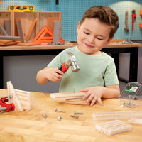 Load image into Gallery viewer, Child playing with a toy hammer and nails