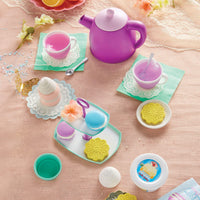 Load image into Gallery viewer, Colorful toy tea set with a purple teapot and cookies