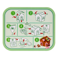 Load image into Gallery viewer, Step-by-step guide for making a gingerbread house on a green tray with illustrations.