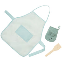 Load image into Gallery viewer, A three-piece baby kitchen play set featuring a large light blue mesh apron with a front pocket, a matching quilted bunny oven mitt, and a wooden spoon, all on a solid white background.