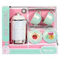 Load image into Gallery viewer, Little Tikes Sweet Spaces tea pot set in its original retail packaging, featuring a retro white and silver tea pot, two mint green teacups, two spoons, and two plates with cute dessert illustrations.