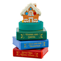 Load image into Gallery viewer, Stack of books with fairy tale titles and a gingerbread house on top against a white background
