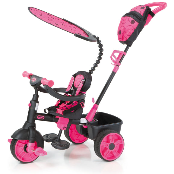 Pink and black children's tricycle with canopy on a white background