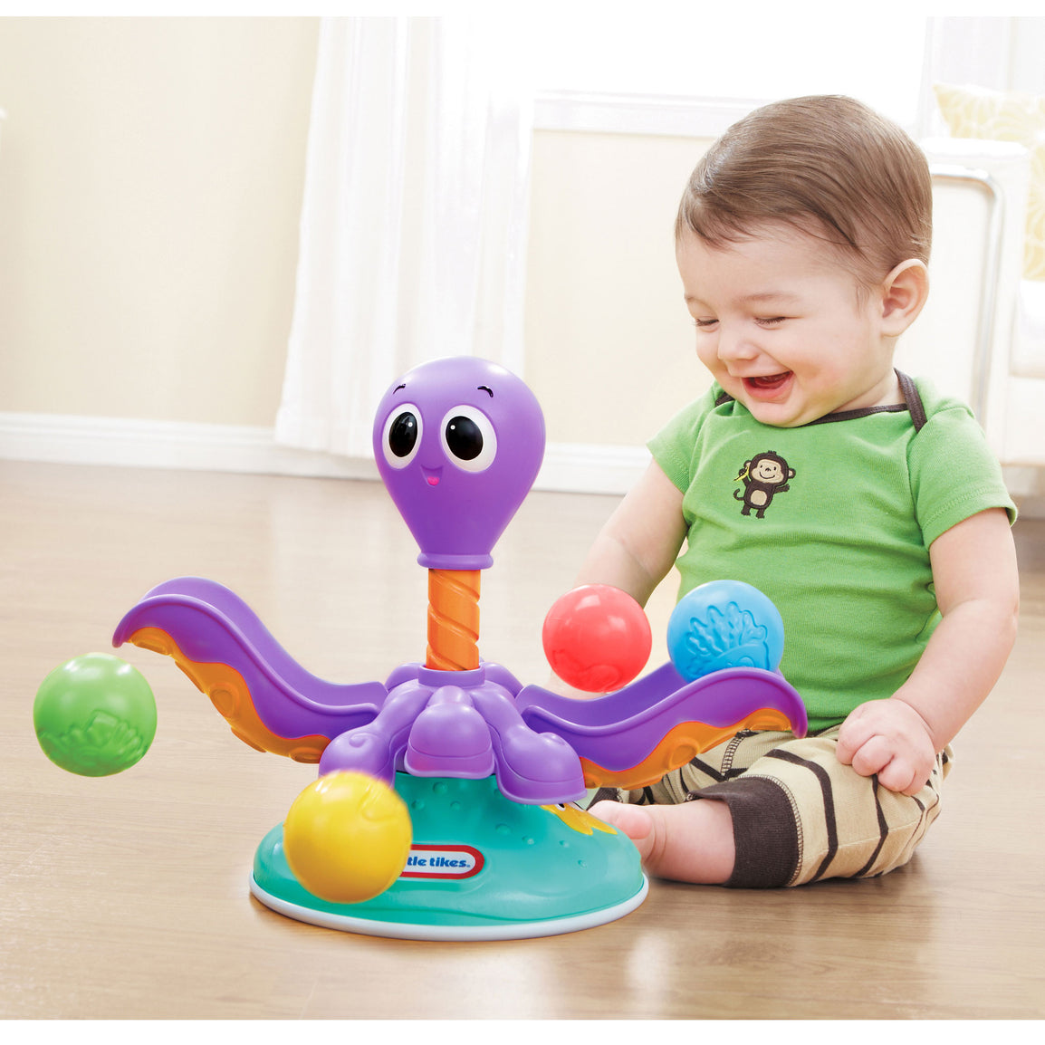 Baby playing with Ball Chase Octopus