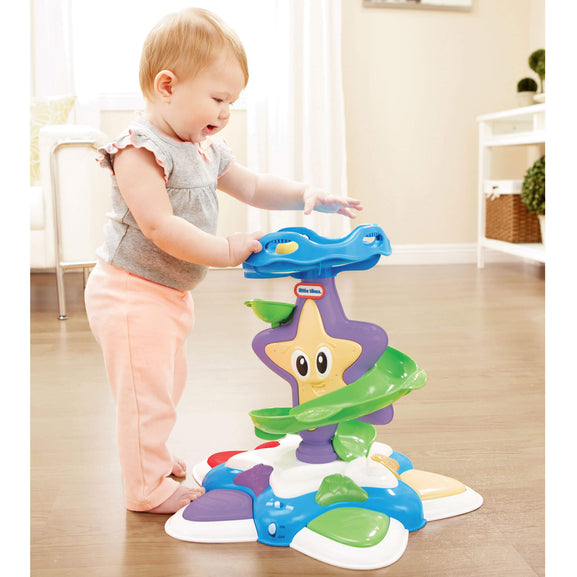 baby standing at the Stand ‘n Dance Starfish