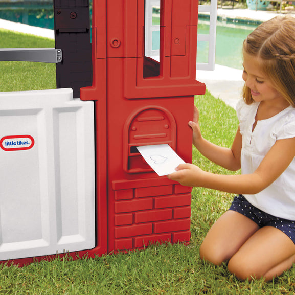 Girl putting mail in mail slot
