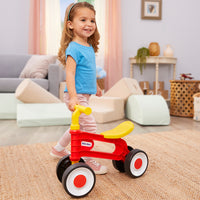 Load image into Gallery viewer, Little girl with a red and yellow tricycle in a living room setting

