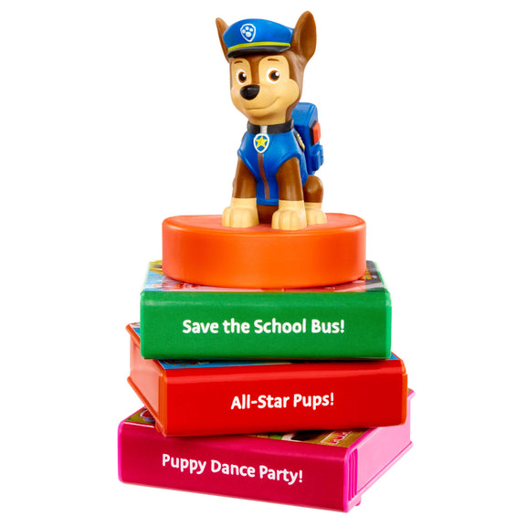 Toy figure on a stack of colorful books with text, on a white background