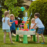 Load image into Gallery viewer, Children playing with a colorful water table in a garden

