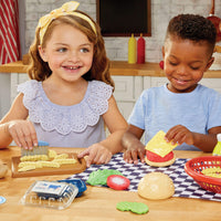 Load image into Gallery viewer, Two children making burgers and fries
