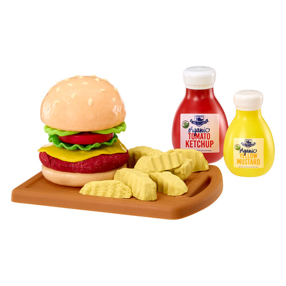 Cheeseburger play food with ketchup and mustard bottles on a white background