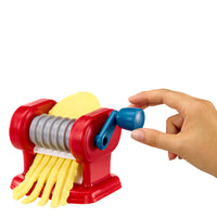 Load image into Gallery viewer, Red and yellow pasta maker with a hand turning the handle on a white background

