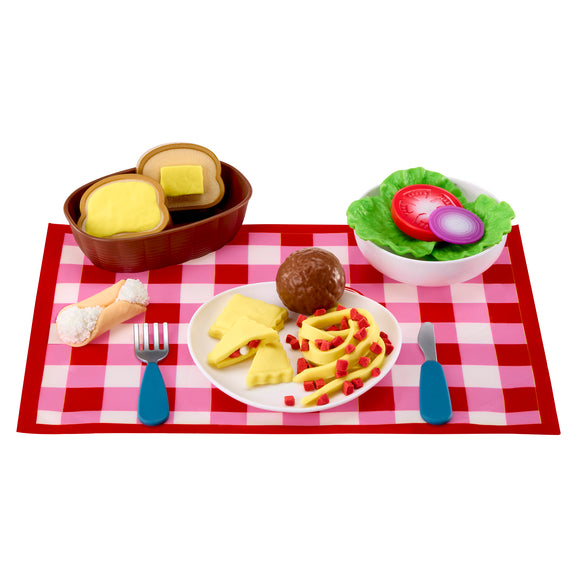 Playset with food items on a red and white checkered tablecloth