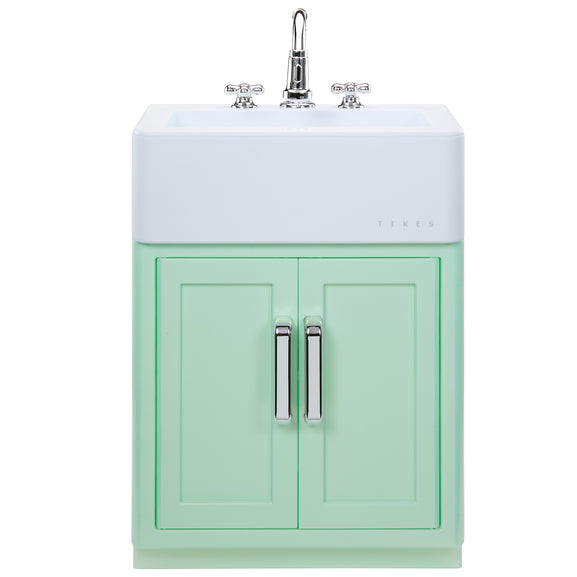 A mint green bathroom vanity cabinet with two doors, silver handles, and a white integrated sink basin with a chrome faucet, shown on a plain white background.