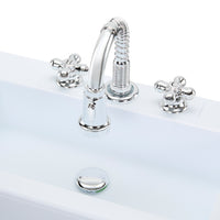 Load image into Gallery viewer, A polished chrome three-hole bathroom faucet set with a curved gooseneck spout, two cross-handle valves, and a matching drain cover, shown installed on a white sink against a white background.
