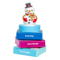 Load image into Gallery viewer, Stack of books with a snowman figurine on top, labeled &#39;Snow Day!&#39;, &#39;Snow Wonder&#39;, and &#39;The Snowball&#39;.
