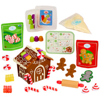 Load image into Gallery viewer, Collection of toy baking and decorating items including a gingerbread house, candy canes, and gingerbread men on a white background.
