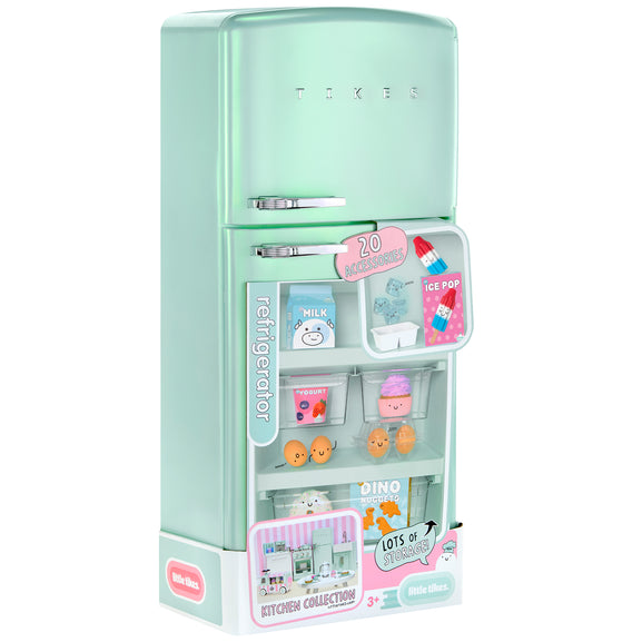 A mint green toy refrigerator with a 'TAKER' logo on the door, shown open with various colorful miniature kitchen accessories inside, including a milk carton, ice pop, cupcakes, and fruit. The toy is displayed on a clean white background.