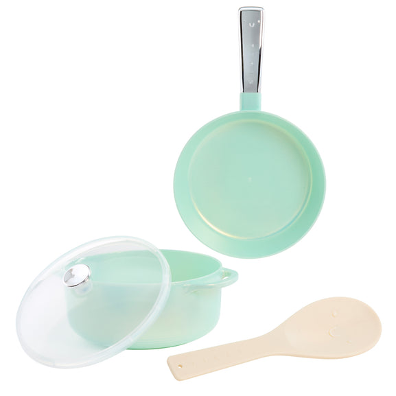 A 3-piece silicone baby feeding set in mint green, including a small frying pan with a silver handle, a small pot with a clear lid, and a beige silicone spatula, displayed on a clean white background.