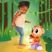 Load image into Gallery viewer, Child dancing with a toy monkey
